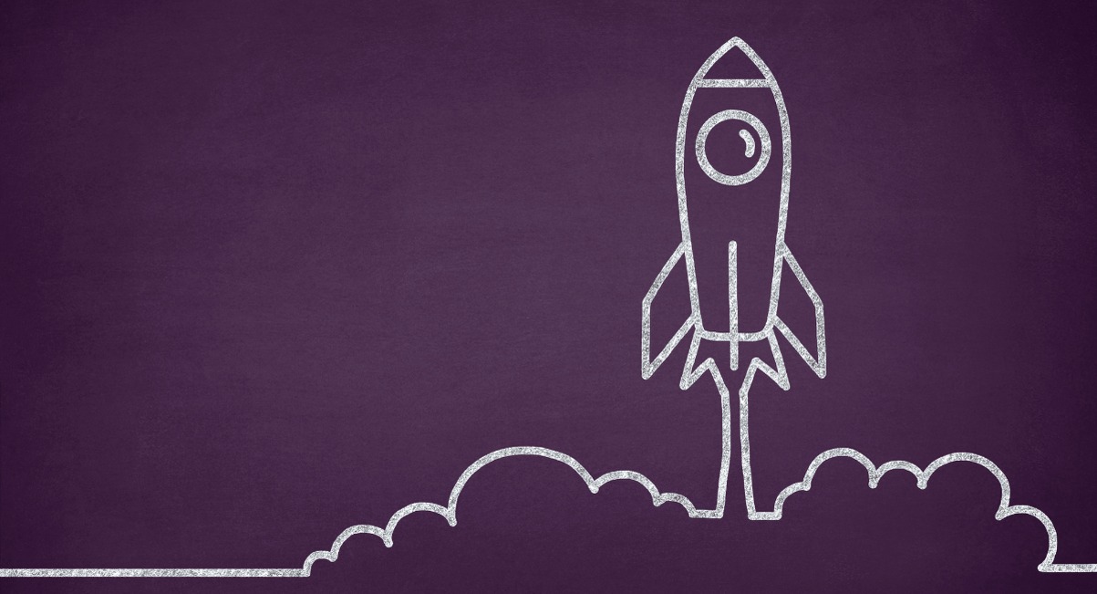 Illustration d'une fusée sur tableau noir symbolisant le lancement d'une startup